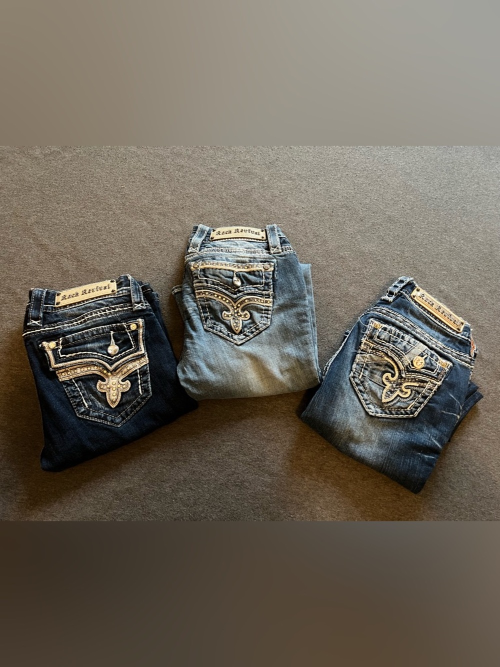 3 pairs of Rock Revival Jeans. Please view photos for sizes/lengths.